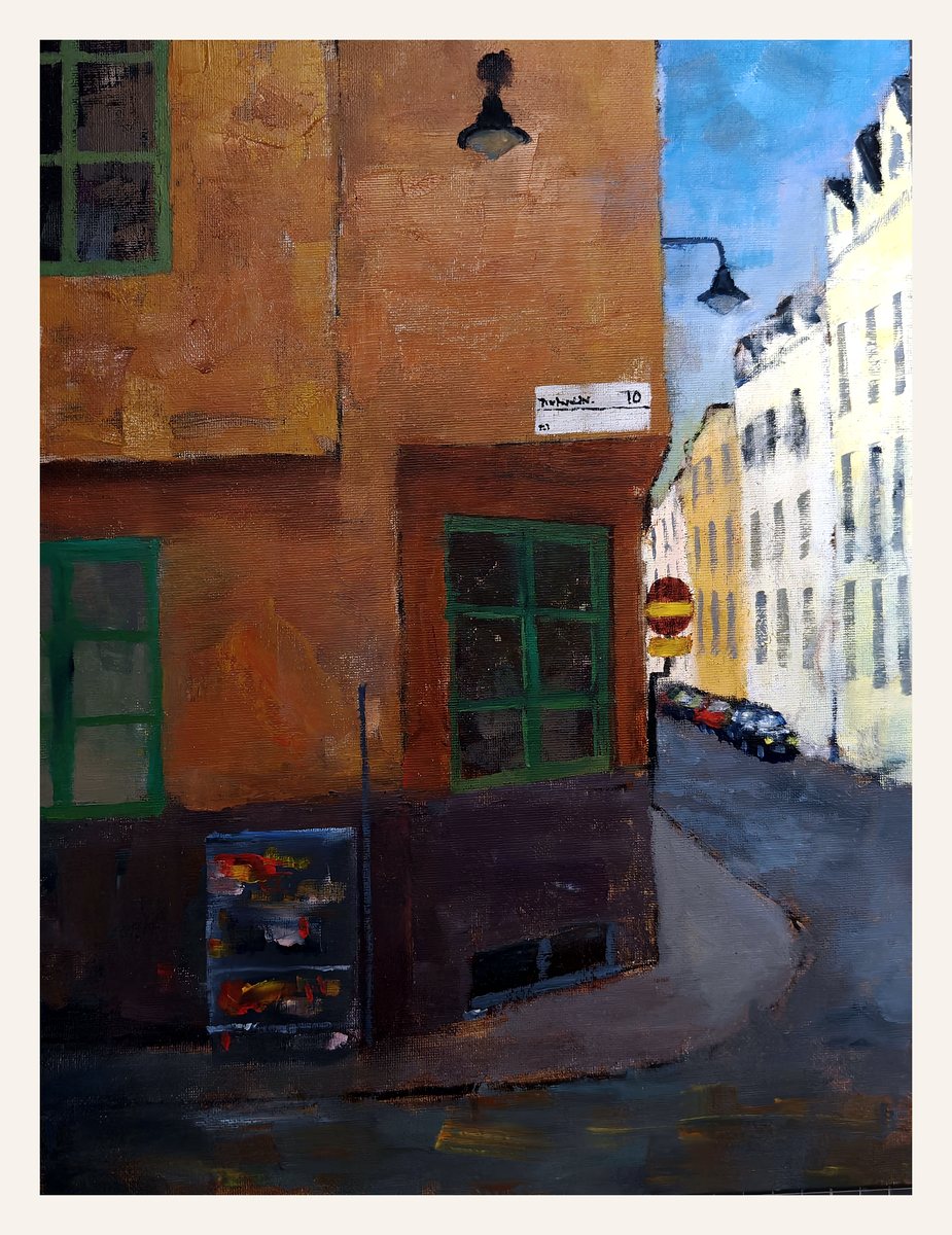 Oil painting of an orange building and a narrow city street